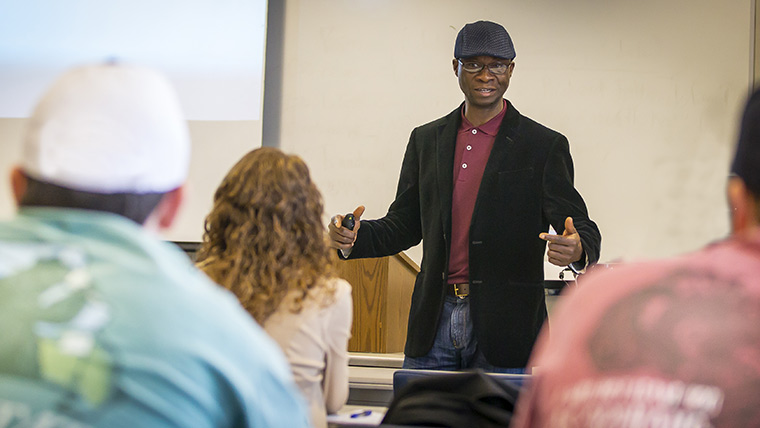 Dr. Bukola Oyeniyi, associate professor in the history department, teaches a class.