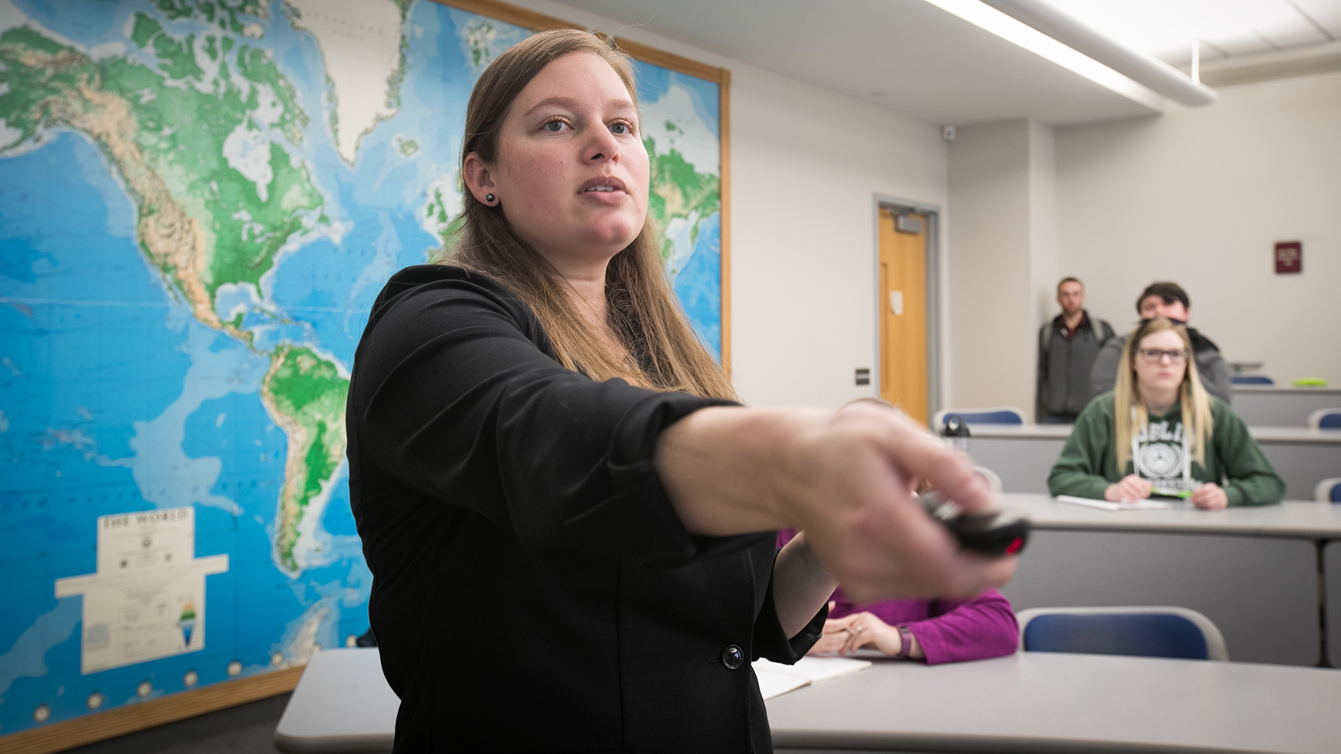 Dr. Julia Troche uses a presentation clicker to teach her Ancient Egyptian History class.