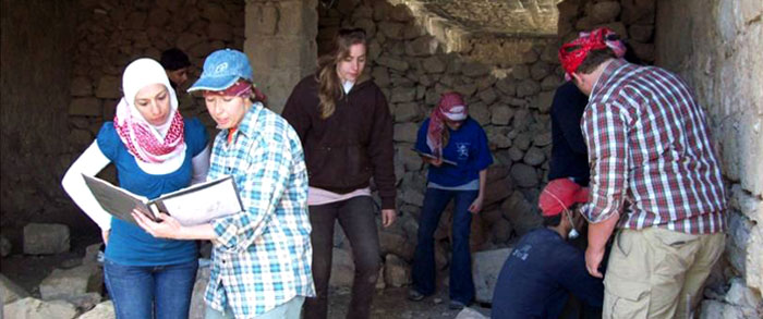 People investigating a historical site